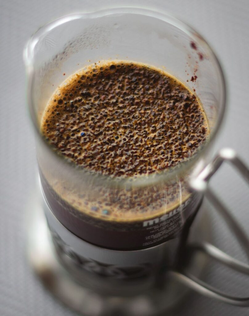 coffee grounds steeping in french press